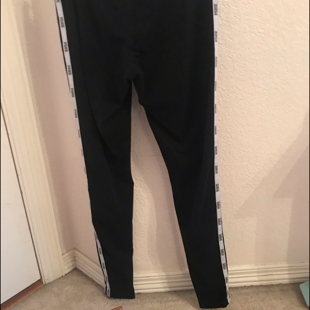 VS pink black leggings with stripes on the sides